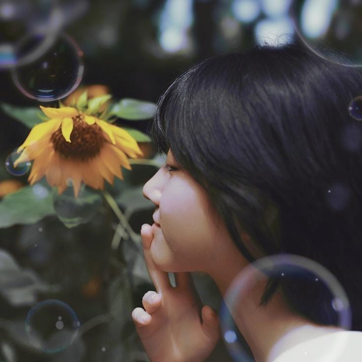 Kaveri Mehta, Lead Design Curator at Harbor Haven Crest, reviewing corporate floral arrangements